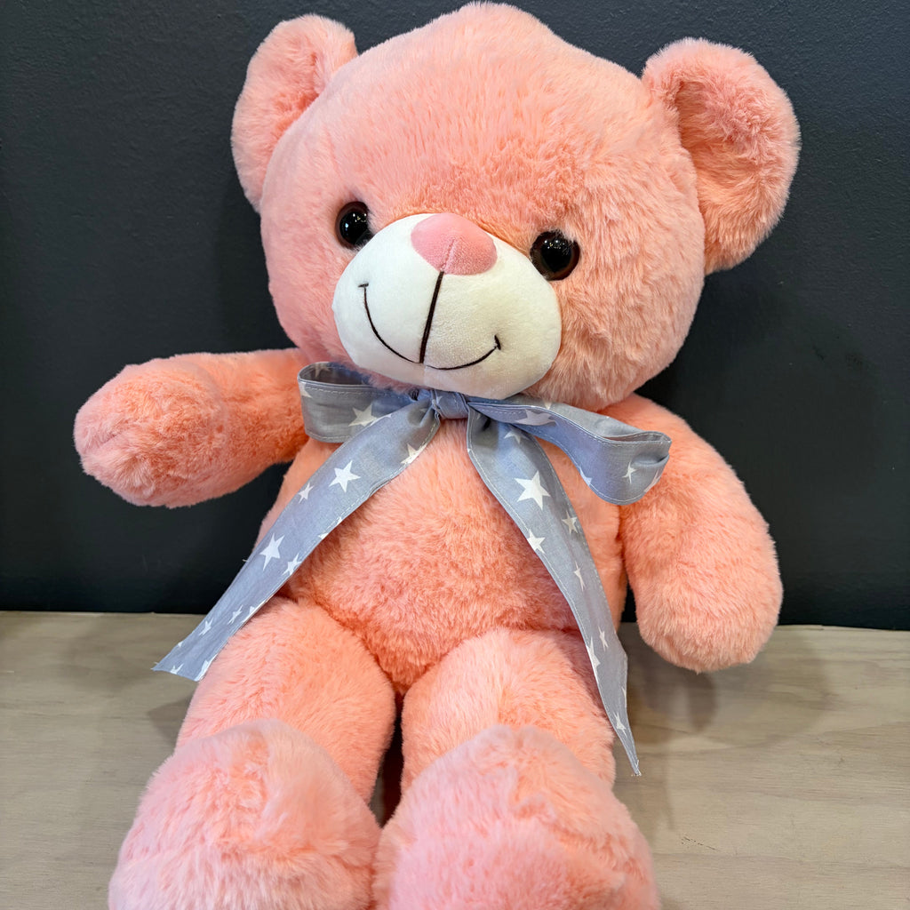 Peluche oso rosado XL con cinta gris de estrellas